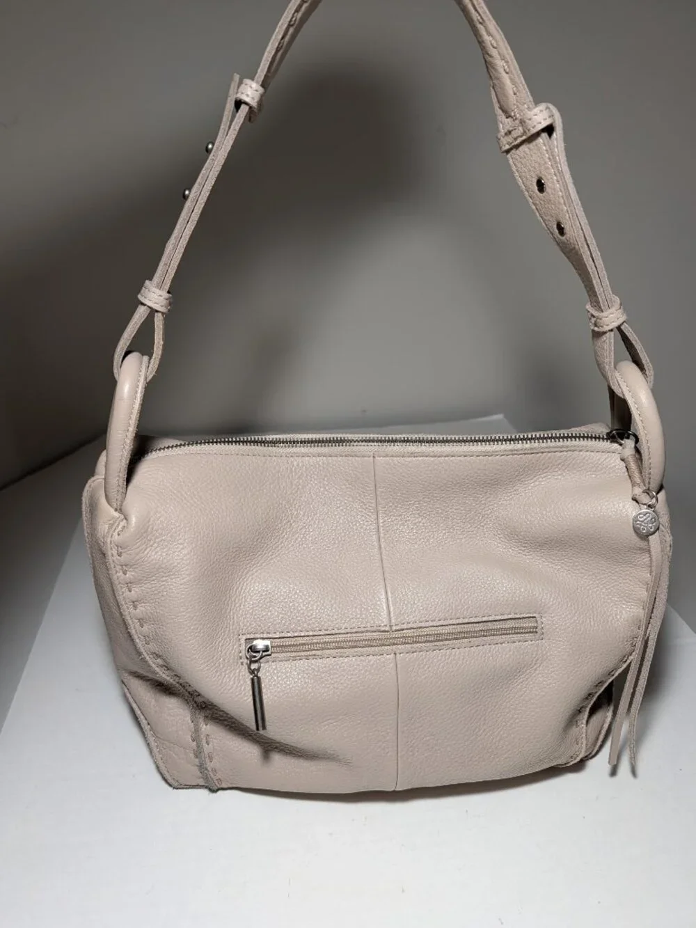 The SAK Pebble Leather Adjustable Top Handle Hobo Purse Cream OS